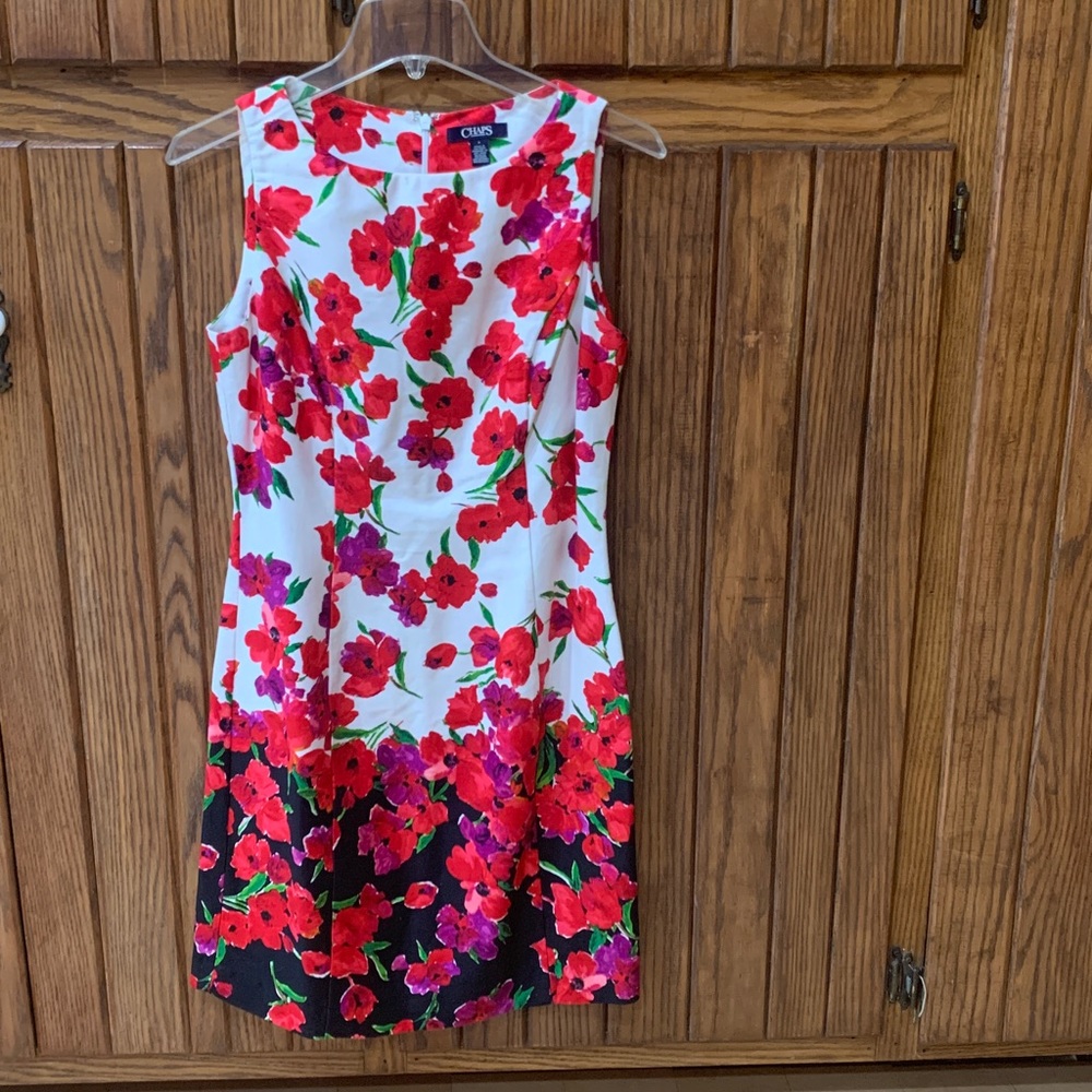 Chaps Sleeveless Sheath Dress 
Designed with red poppy flowers 
Size 4